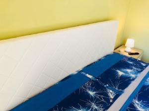 Postel nebo postele na pokoji v ubytování Simone Home