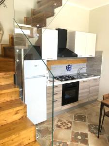 Kuchyň nebo kuchyňský kout v ubytování Simone Home