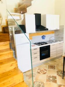 Kuchyň nebo kuchyňský kout v ubytování Simone Home