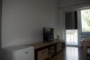 TV a/nebo společenská místnost v ubytování Piętówka
