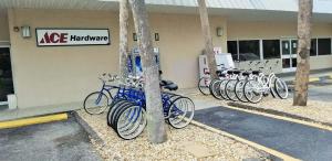 a row of bikes parked in front of a store at Beach and sunset view from your balcony in Longboat Key