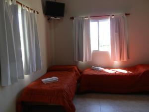 Un pat sau paturi într-o cameră la Costa Luna Federacion