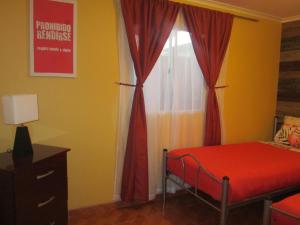 Giường trong phòng chung tại Casa TINY