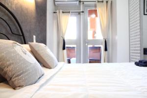 Postel nebo postele na pokoji v ubytování El Hamra Hotel