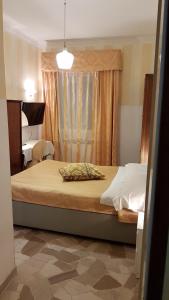 フィレンツェにあるスーベニア   マヤのベッドルーム1室(大型ベッド1台、窓付)