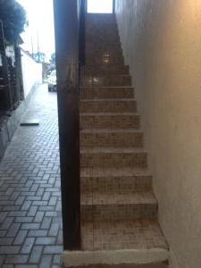 a set of stairs leading up to a building at Residencial Correa Pereira in Canela