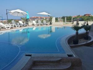 Bazén v ubytování Taai Hotel nebo v jeho okolí