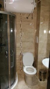Koupelna v ubytování Taai Hotel