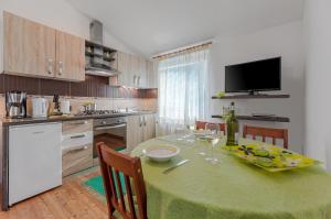 Кухня або міні-кухня у Apartment San