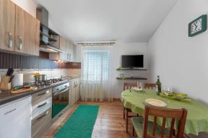 Кухня або міні-кухня у Apartment San
