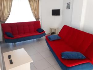 A seating area at Paradise Apart Hotel