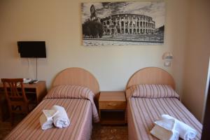 Un ou plusieurs lits dans un hébergement de l'établissement Madre Chiara Domus