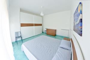 Postel nebo postele na pokoji v ubytování Scauri resort