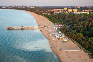 an aerial view of a beach with people on it at Apartament Plaża in Gdańsk