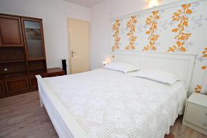 Postel nebo postele na pokoji v ubytování Filipi Apartment