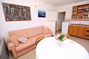 Posezení v ubytování Filipi Apartment