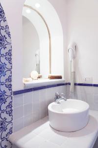 Koupelna v ubytování Quartara Boutique Hotel