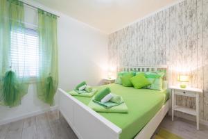 Postel nebo postele na pokoji v ubytování Apartment Semes