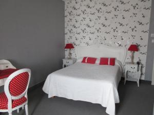 Postel nebo postele na pokoji v ubytování Le Trianon