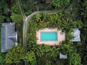 an aerial view of a resort with a swimming pool at Mae Nai Gardens in Ban Mae Mae