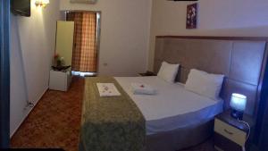 Letto o letti in una camera di Hotel Pishat e Buta