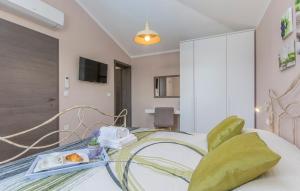 Postel nebo postele na pokoji v ubytování Villa Contessa