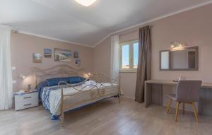 Postel nebo postele na pokoji v ubytování Villa Contessa + 16 fotografií