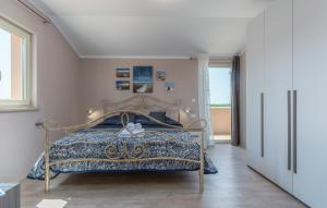Postel nebo postele na pokoji v ubytování Villa Contessa