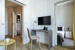 Telewizja i/lub zestaw kina domowego w obiekcie Arche Hotel Poloneza