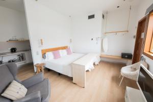 Posteľ alebo postele v izbe v ubytovaní Hotel Catalina