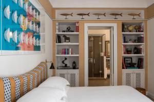 Ліжко або ліжка в номері Capri Tiberio Palace - The Leading Hotels of the World