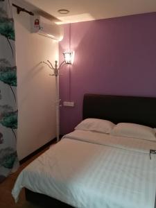 Postel nebo postele na pokoji v ubytování Coral Home 珊瑚之家