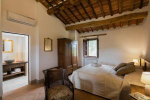 Een bed of bedden in een kamer bij Villa Ancano