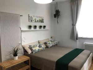Letto o letti in una camera di B&B Sea and Garden