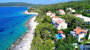 an aerial view of a village on a beach at Villa Nova in Vela Luka