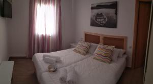 Cama o camas de una habitación en La Aceitera de Trafalgar