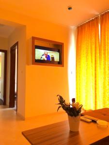 TV a/nebo společenská místnost v ubytování Sunny Paradise Family Hotel