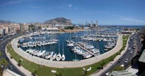 a harbor filled with lots of boats in the water at Palermo Gallery in Palermo