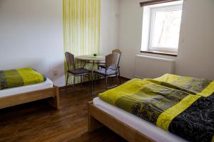 Postel nebo postele na pokoji v ubytování Penzion Starobor