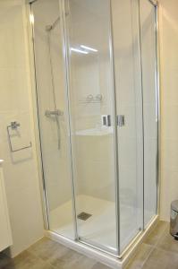 Koupelna v ubytování Apartamentos Sábora + 19 fotografií