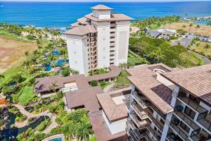 an aerial view of a building and the ocean at TOP Floor Penthouse with Panoramic View - Ocean Tower at Ko Olina Beach Villas Resort in Kapolei