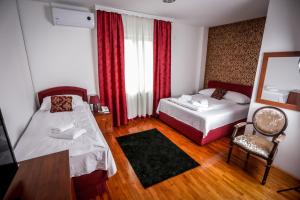 Ένα ή περισσότερα κρεβάτια σε δωμάτιο στο Hotel BOB