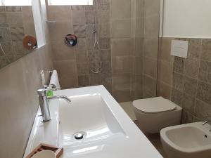 Koupelna v ubytování Hotel Pedretti