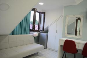 Posezení v ubytování Nicolas Boutique Hotel