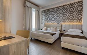 Posteľ alebo postele v izbe v ubytovaní Hotel San Marco & Formula Club + 37 fotografií