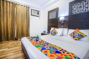 Postel nebo postele na pokoji v ubytování Hotel Sunstar Heights + 21 fotografií