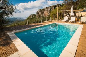 The swimming pool at or close to Castelli Olive Press Még 25 kép