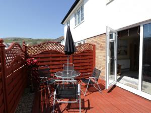 En balkon eller terrasse på West Shore Cottage + 6 billeder