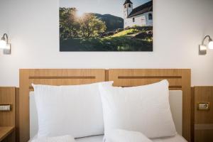 Posteľ alebo postele v izbe v ubytovaní Mondschein Rooms