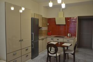 Virtuvė arba virtuvėlė apgyvendinimo įstaigoje zhk Santorini